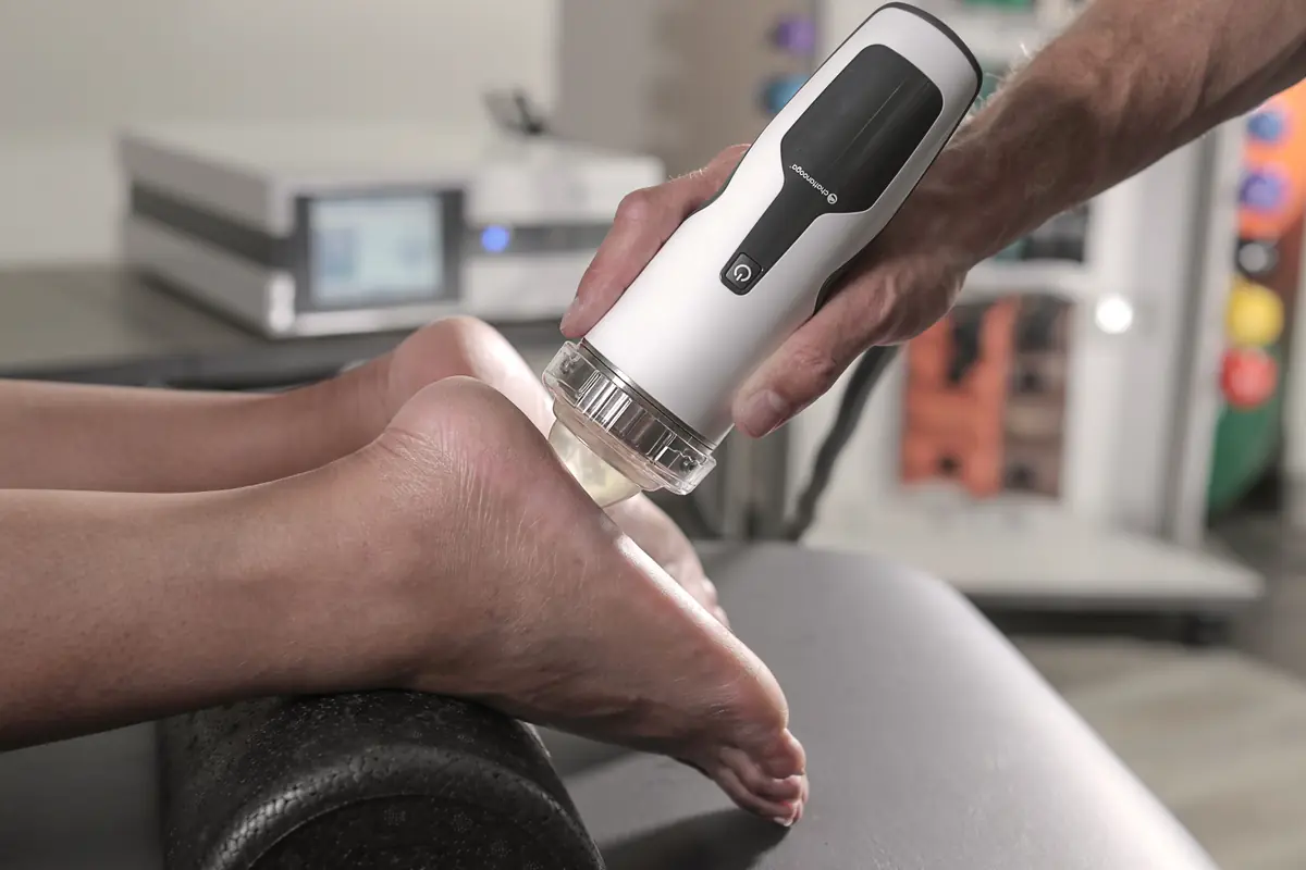 Focused shockwave therapy equipment in use with a patient